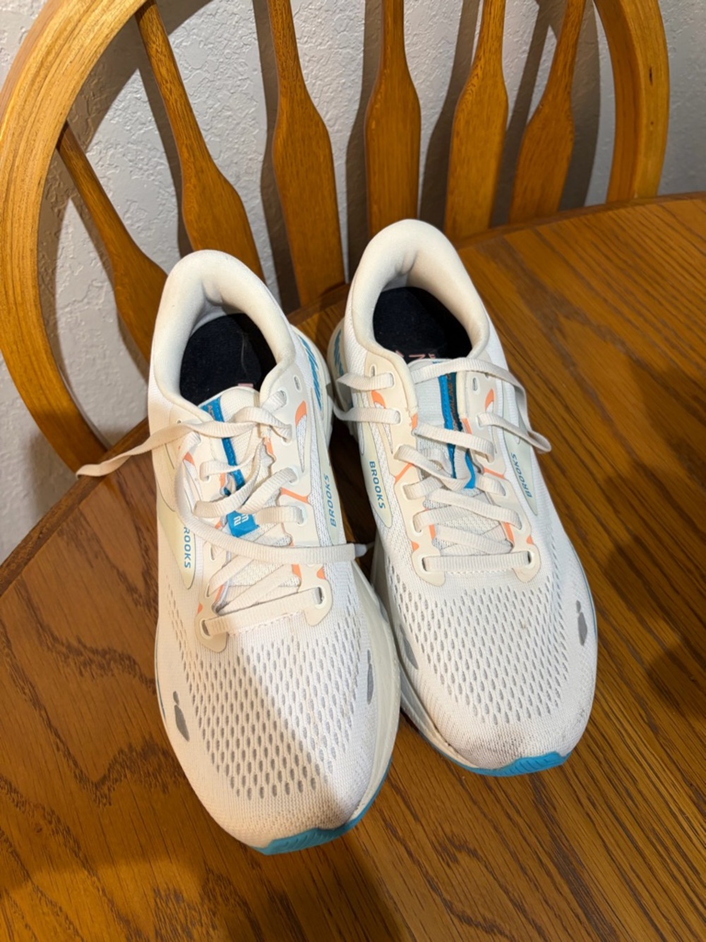 Brooks White Running Shoes with Blue and Peach Accents